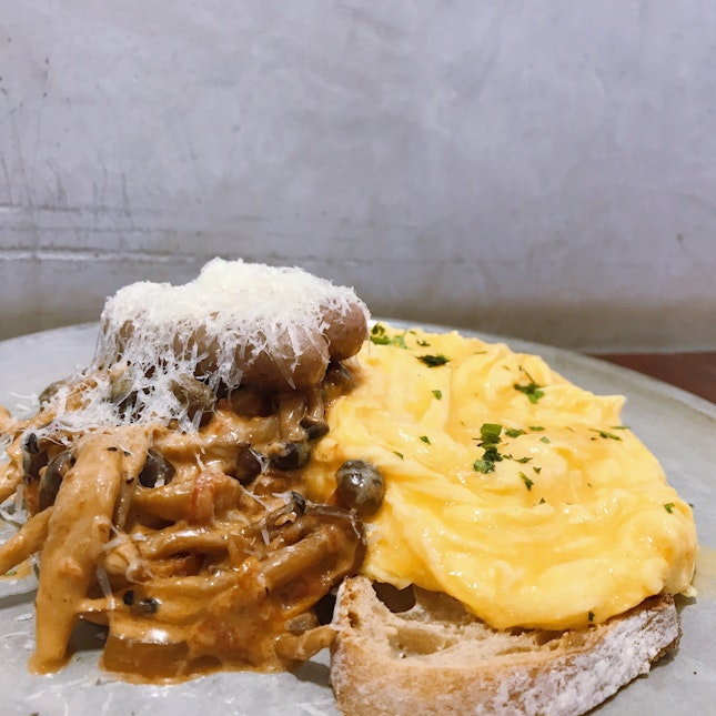 Creamy mushrooms with sausages on sourdough