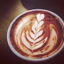 first passable tulip in the form of a peppermint hawt chawclit ™ #latteart #coffee