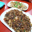 Go for the oyster omelette, satay and chicken wings!