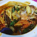 Curry fish head cooked by my cousin and sharing the meal with my other cousins.
