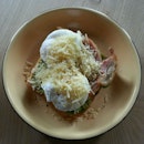 Poached Eggs With Guacamole And Bacon On Toast