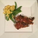 Ancho chile rubbed chicken with a light string bean corn salad