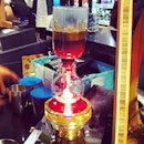 Watching the gourmet coffee slowly dripping down to form the perfect cuppa - 18 Gram at City'super #hongkong
