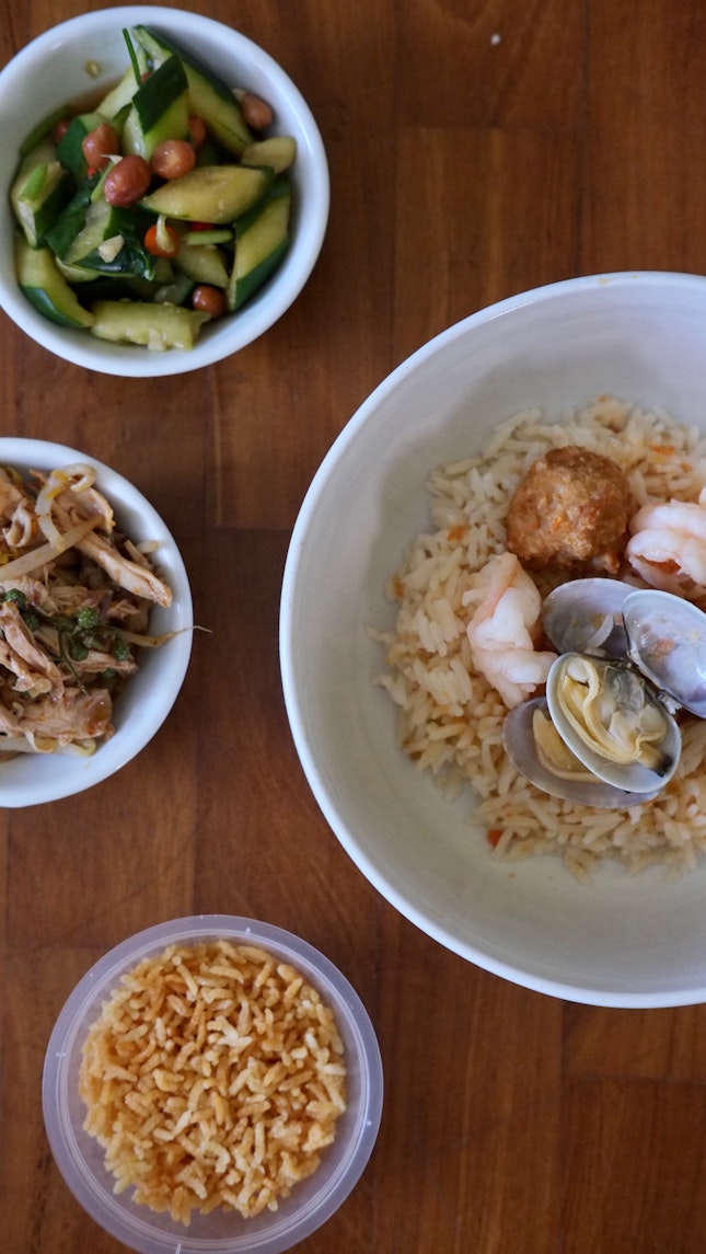 Golden Poached Rice with Seafood in Prawn Broth ($17.90++)