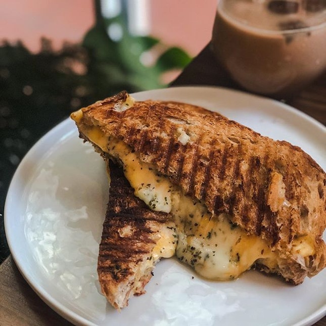The satisfying crunch of the grilled cheese toasties.
