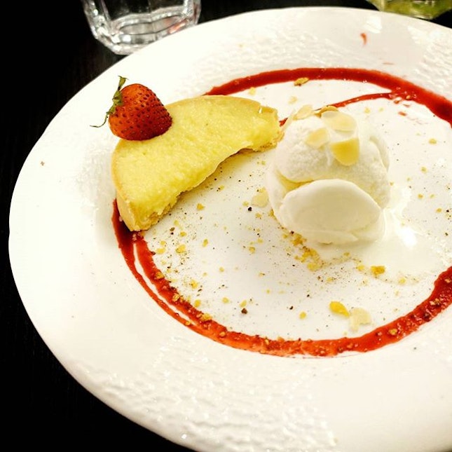 SG50 $50nett set meal dessert of the day : Half a lemon curd tart with crispy crust, served with a scoop of vanilla ice cream.