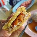 3-in-1 fried sticky rice cake sandwiched between sweet potato & yam...