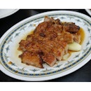 Succulent fried pieces of pork ribs in sweet sauce..