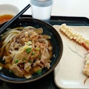 Soft chewy udon in light soup broth with sliced pork (small bowl at $6.90), with additional tempura add-on!