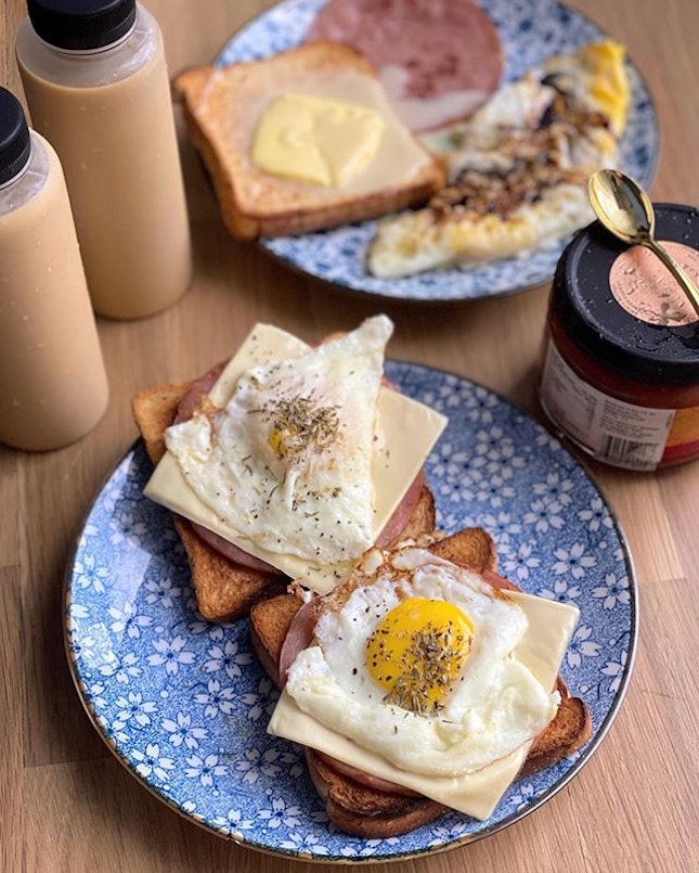 Ham, cheese & egg on toast for the man while i prefer the HK style, overeasy eggs with dark sauce, ham and toast topped with butter and drizzled with condensed milk.