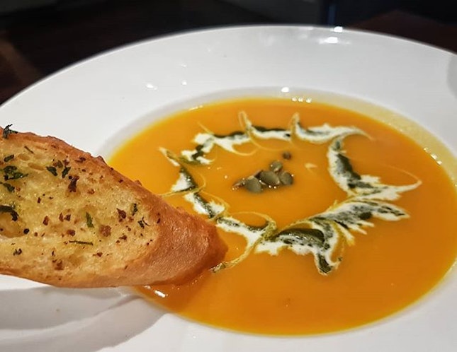 Pumpkin soup  served with 3 slices of toasted french bread S$14
The pumpkin soup was smooth with hints of sweetness.