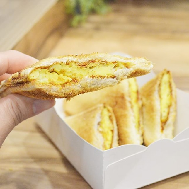 Tom Yum Toast - Omelette sandwiched between 2 slices of toast slathered with a thin layer of tom yum paste.