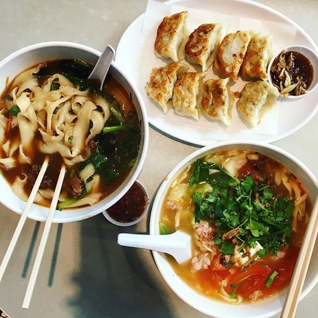 Comforting noodles (beef hand-sliced noodles and tomato soup noodles) with some really tasty pan-fried dumplings.