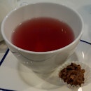 Cant go wrong with berry #tea and a chocolate coated cornflakes on a grey rainy day.