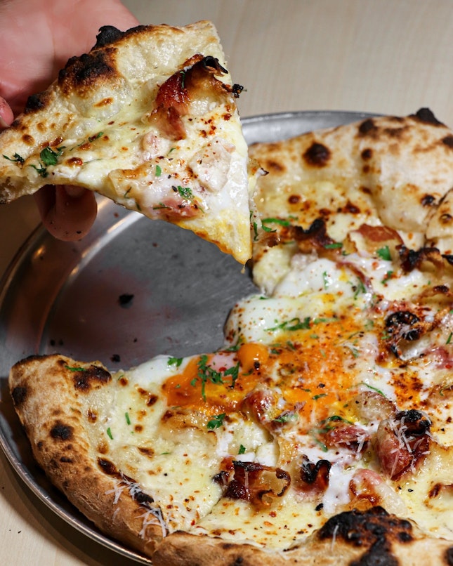 A Neapolitan pizzeria in Singapore that you should absolutely check out and indulge in pies with quirky names such as Pepper Pig ($30) and Shellfish Love ($28), or the dine-in exclusive Guanciale & Egg ($28).