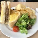 Beef Brisket And cheese Sandwich (served With Chips And Salad) $11.80
