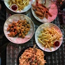 Salted Egg Popcorn Chicken ($12), Mentaiko Fries ($10), Truffle Fries ($10), Spam Fries ($8)
