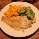 Grilled Fish With Herbs, $11.50 with your choice of 2 sides which i chose the garden veggie and mac and cheese.