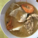 Seafood soup with fish, prawns and minced meat