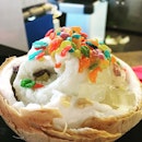 Happy sprinkles atop coconut ice cream!