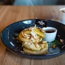 Coconut Pancakes | coconut-infused pancakes served with caramelized banana and candied cashew nuts