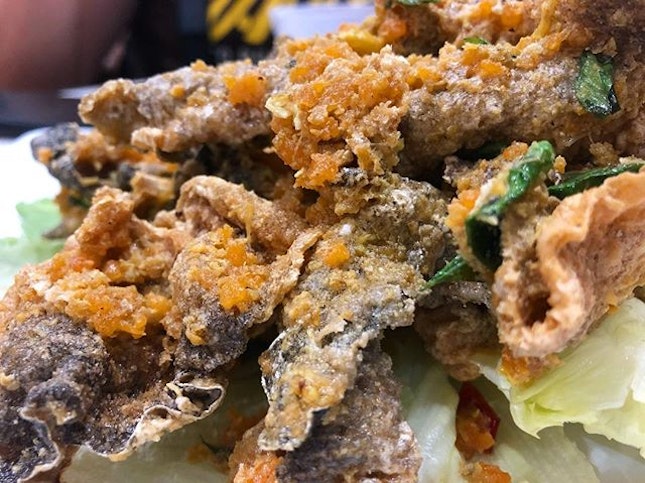 Fried fish skin with generous servings of salted egg.