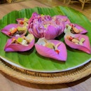 Roasted coconut, line, and shallot wrapped in lotus leaves 