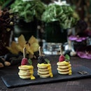 Mini Pancakes Stack with Mixed Berries & Passion Fruit Cream ( $8 ).