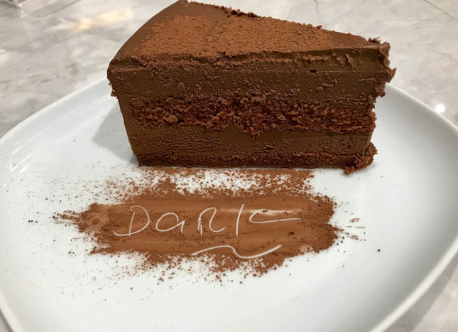 Dark Chocolate Cake ($8.80/slice)