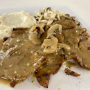 Pork Chop With Mushroom Sauce + Mash Potatoes & Sautéed Mushrooms ($8)