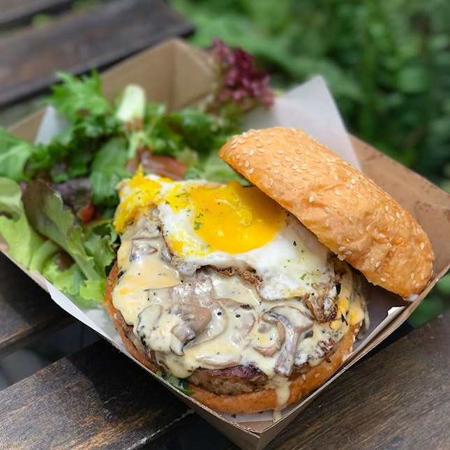 Mushroom chicken burger [$13.90] with sunny side up [+$1] // With your choice of salad/fries, this burger comprised of a 180g pan fried chicken patty, cheese, mushroom ragout, arugula sandwiched between two toasted sesame brioche buns.