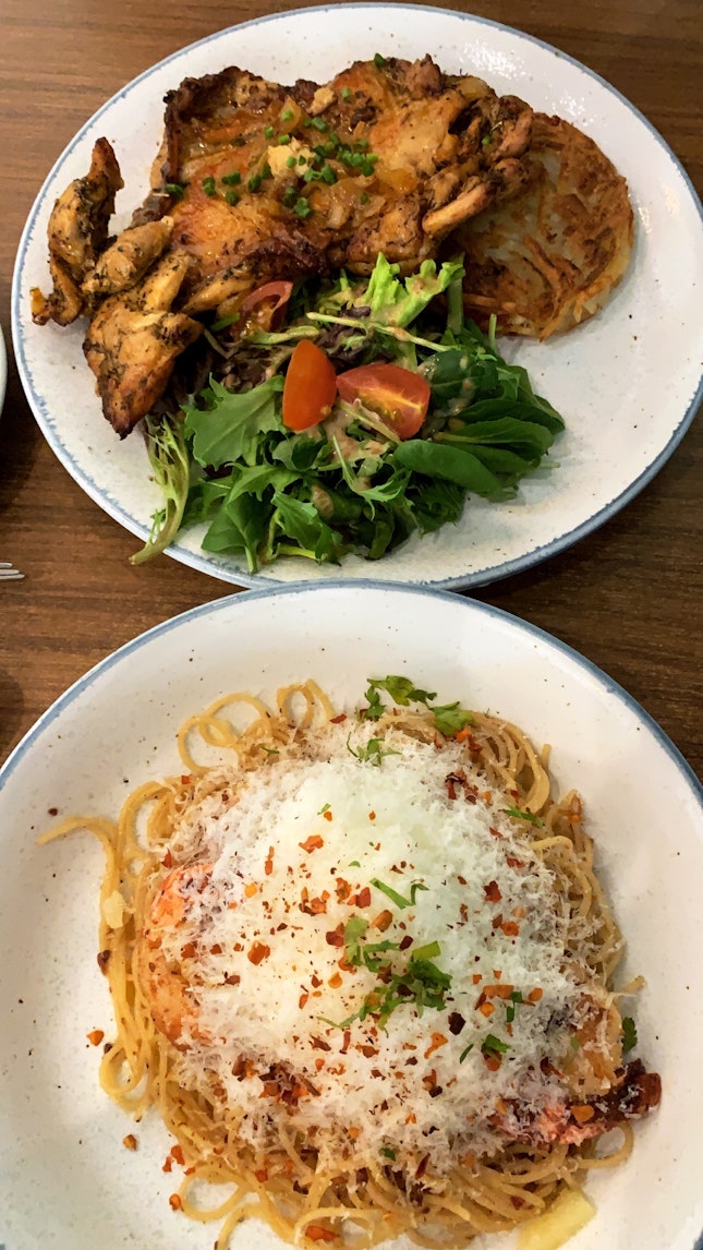Grilled Cajun Chicken and Toasty Aglio Olio with Tiger Prawns
