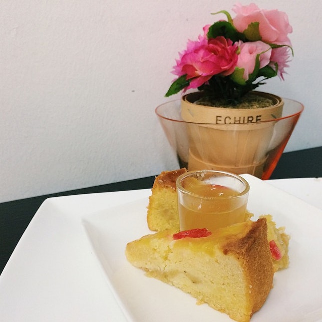 Pineapple pound cake with a shot of orange pear fruit enzyme.