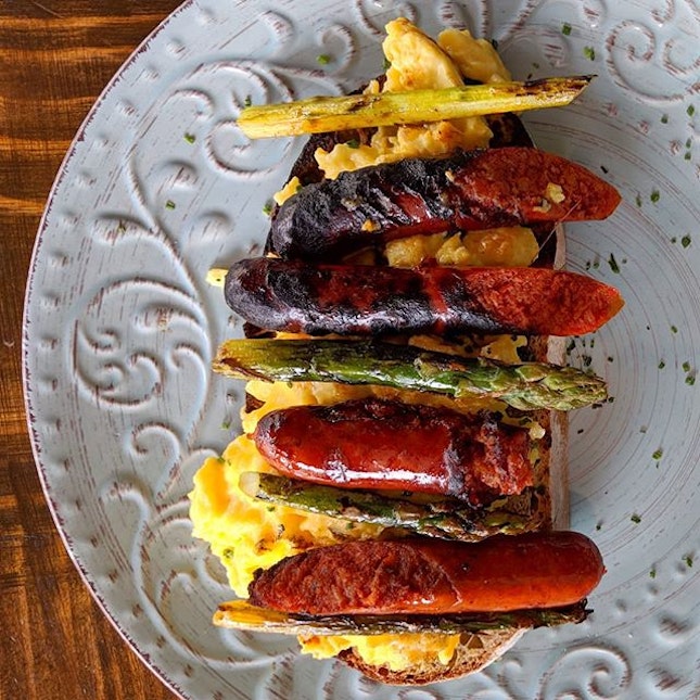 Asparagus & Grilled Chorizo with Scrambled Eggs on Sourdough Toast from Firebake (@firebakesg).