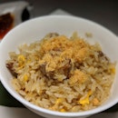 Hunan-style Foie Gras Fried Rice from the "Capella Celebrates Ten" menu at Cassia, Capella Singapore (@capellasingapore).