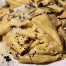 Pappardelle with parmigiano-reggiano cheese, porcini mushrooms and white truffles.