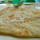 The paratha goes SUPER well with sugar.