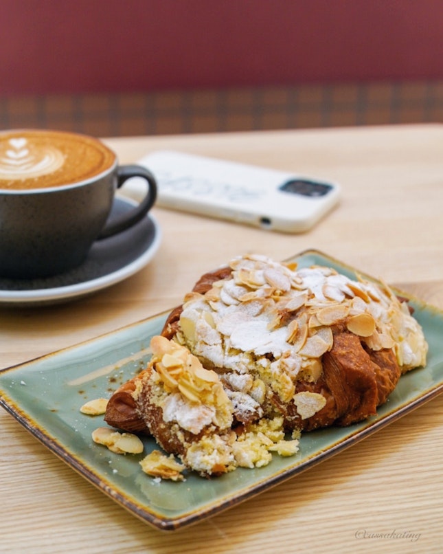 Almond Croissant ($6) And Flat White ($6)