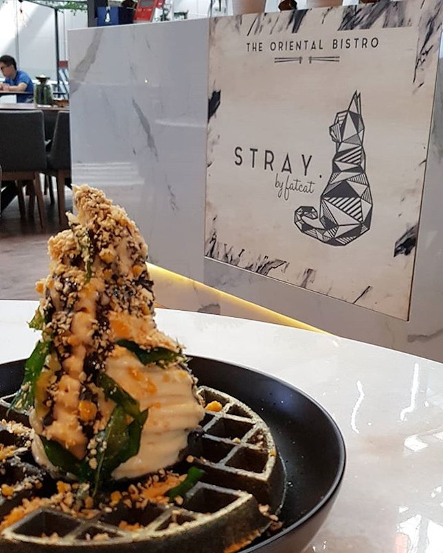 Black & Gold - Their signature charcoal waffle with salted egg yolk soft serve and cereals.