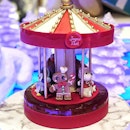 A Limited Edition Christmas Signature Carousel Cake ($298.00) made with pain d’epices (French spice cake), orange marmalade, and jivara bavaroise.