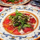 Beef Carpaccio with Rocket, Shaved Parmesan Cheese, Balsamic and Lemon