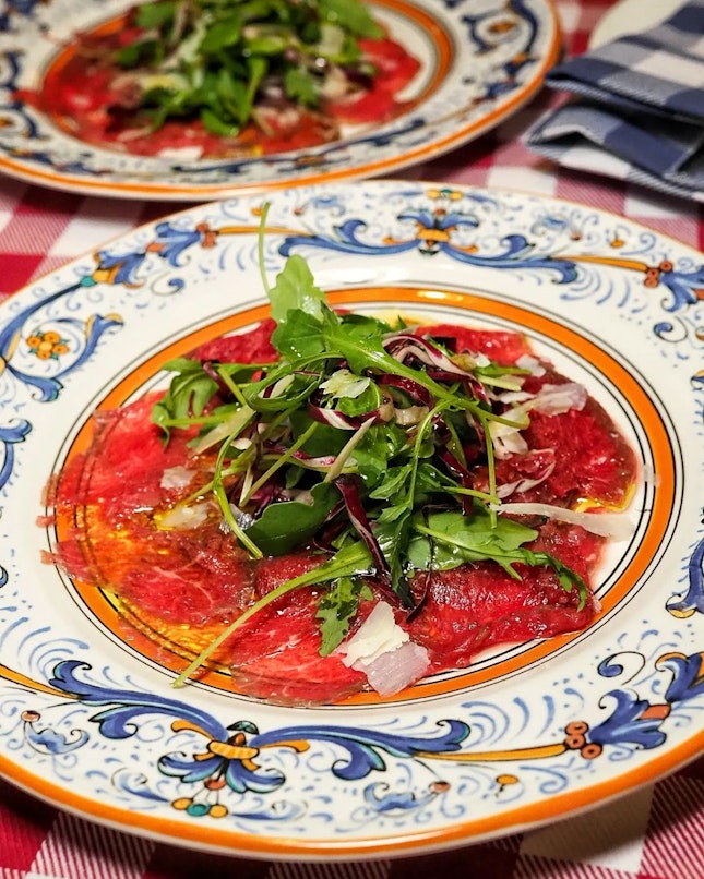 Beef Carpaccio with Rocket, Shaved Parmesan Cheese, Balsamic and Lemon