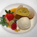 Mortar's banana fritters [$8.80] "Goreng pisang" served with vanilla ice cream, mixed berries and pineapple reduction.
