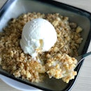 Apple & banana crumble [$8.80++] Warm apple & banana compote topped with oat crumbles and served with a scoop of vanilla ice cream.
