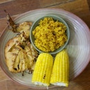 1/4 Chicken With Corn And Rice As Sides