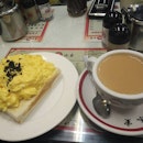 Scrambled Egg Toast w/ Hong Kong Milk Tea - a typical high tea at Hong Kong's Cafe; only to be topped with heavenly matched truffle.