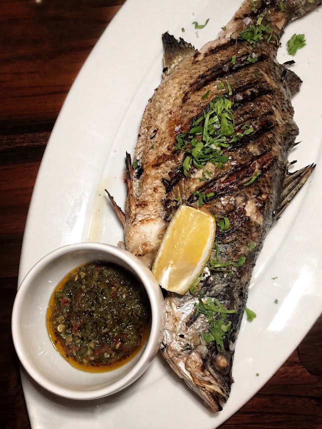 Whole Grilled Baby Sea Bass ($28)