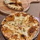 Calzone ($24) & Marinara Pizza ($22)