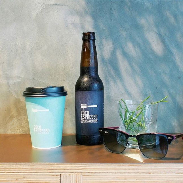 Quenching thirst with an ice cold brew black coffee.