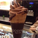 OMG #Godiva soft serve $8 per cone.